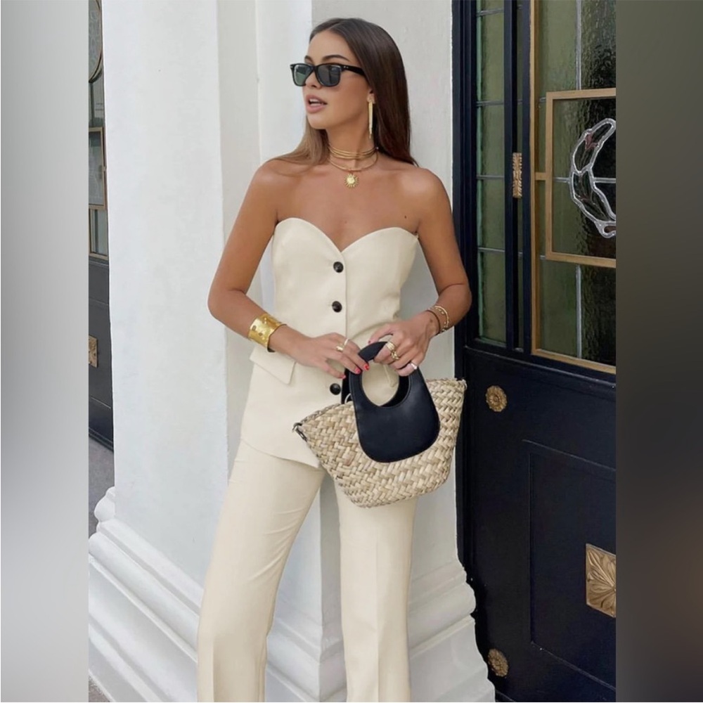 Commense Cream Strapless Jumpsuit with Wide-Leg Silhouette